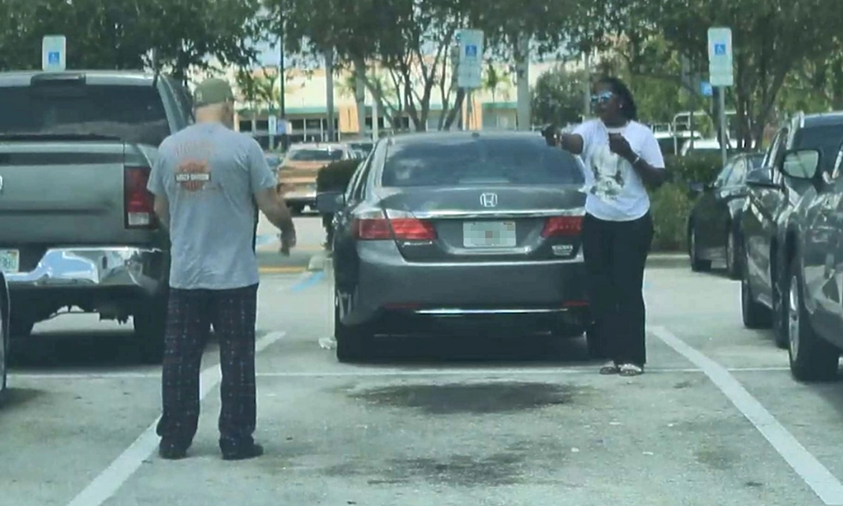 American woman shoots after supermarket parking dispute