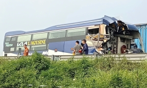 Passenger bus crashes into tractor-trailer, one dead