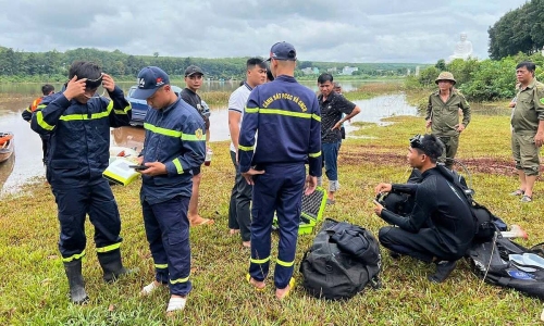 Search for female driver suspected missing after car swept away by flood