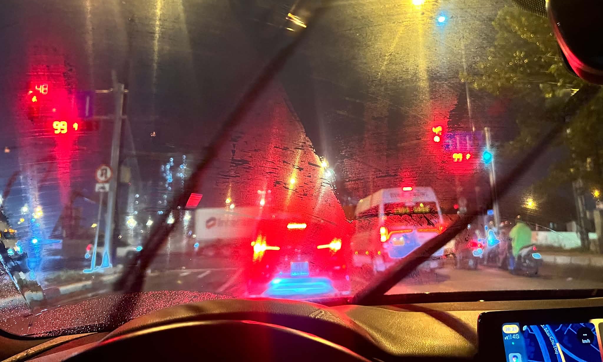 Why do windshield wipers blur the view in the rain?