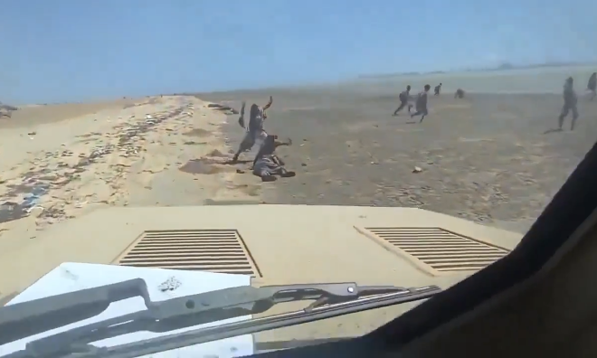 Yemen government forces ram armored vehicle into Houthi fighters