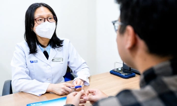 How many times a day should you gargle with saline solution?