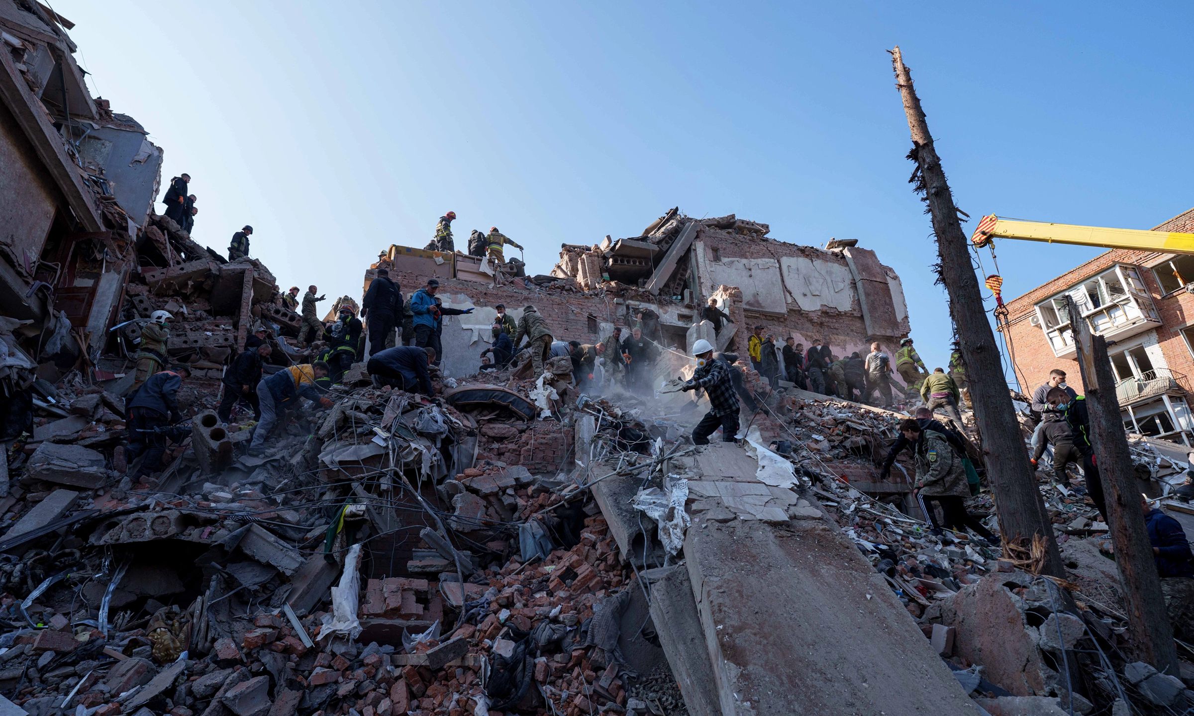 Ukraine apartment building hit by missile, 22 dead