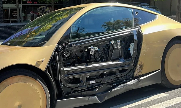 Tesla's plastic car door stripped bare after minor collision