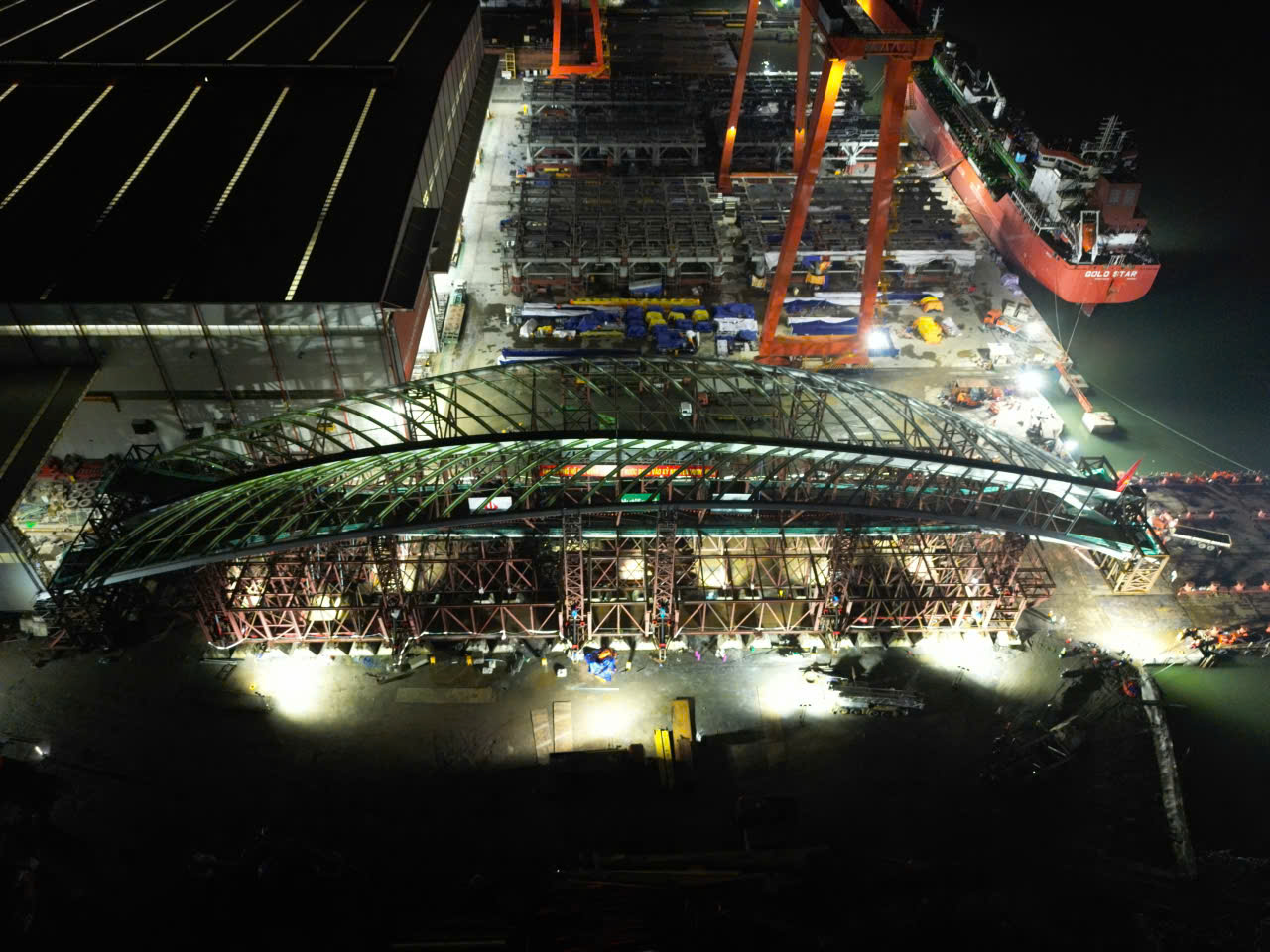 Heavy-duty vehicle fleet used to launch 3,400-ton pedestrian bridge span across the Saigon river
