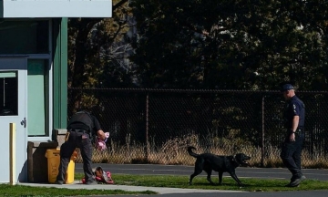 Teacher throws phone, struggles with school shooter in US