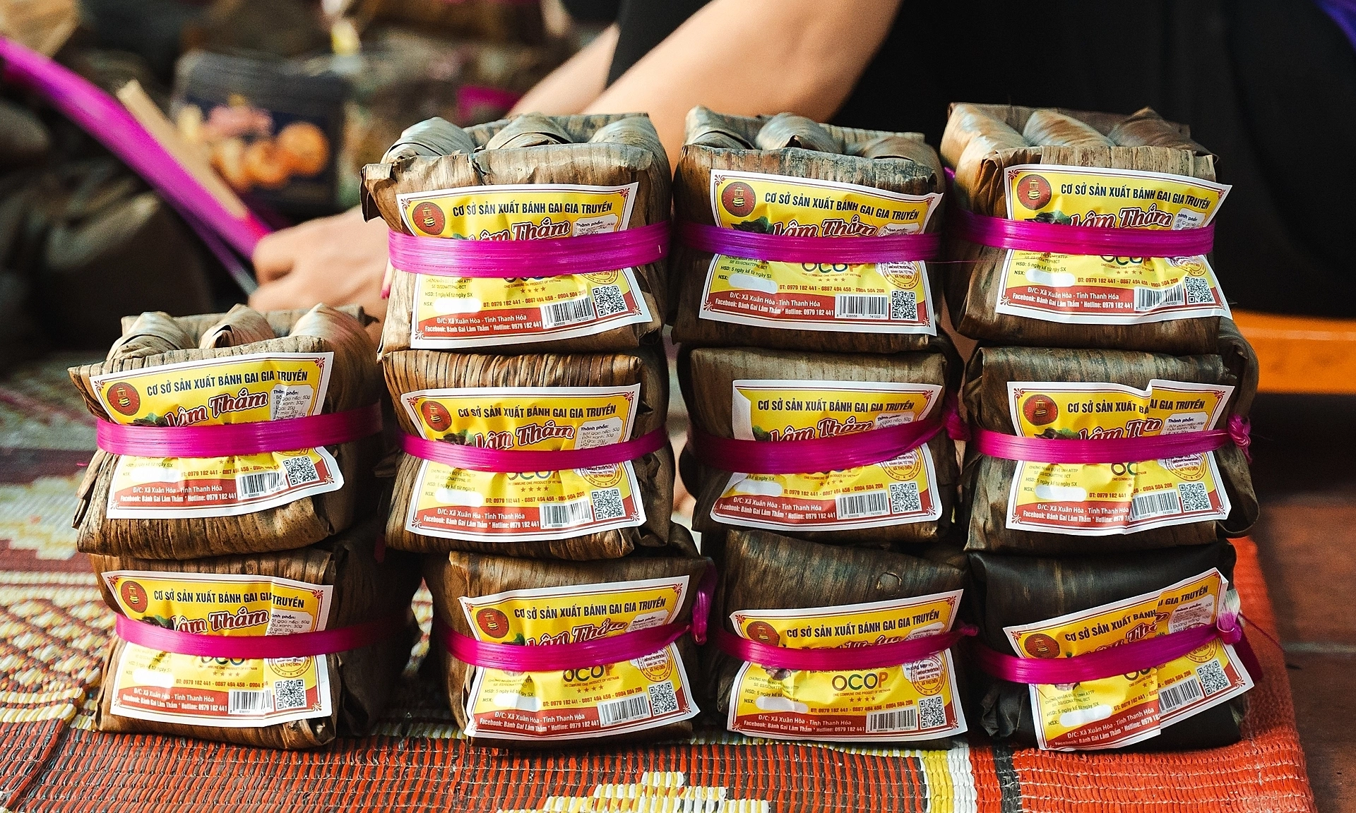 Why Tu Tru thorn leaf cake is wrapped with red string